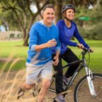 Diabetes Exercise Blood Sugar Balancing Prediabetic Program man running and women's on bike smiling