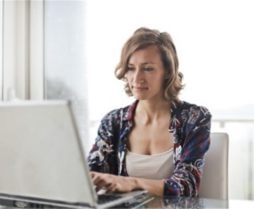 Hair Test  women on computer with telehealth for Hair Test 